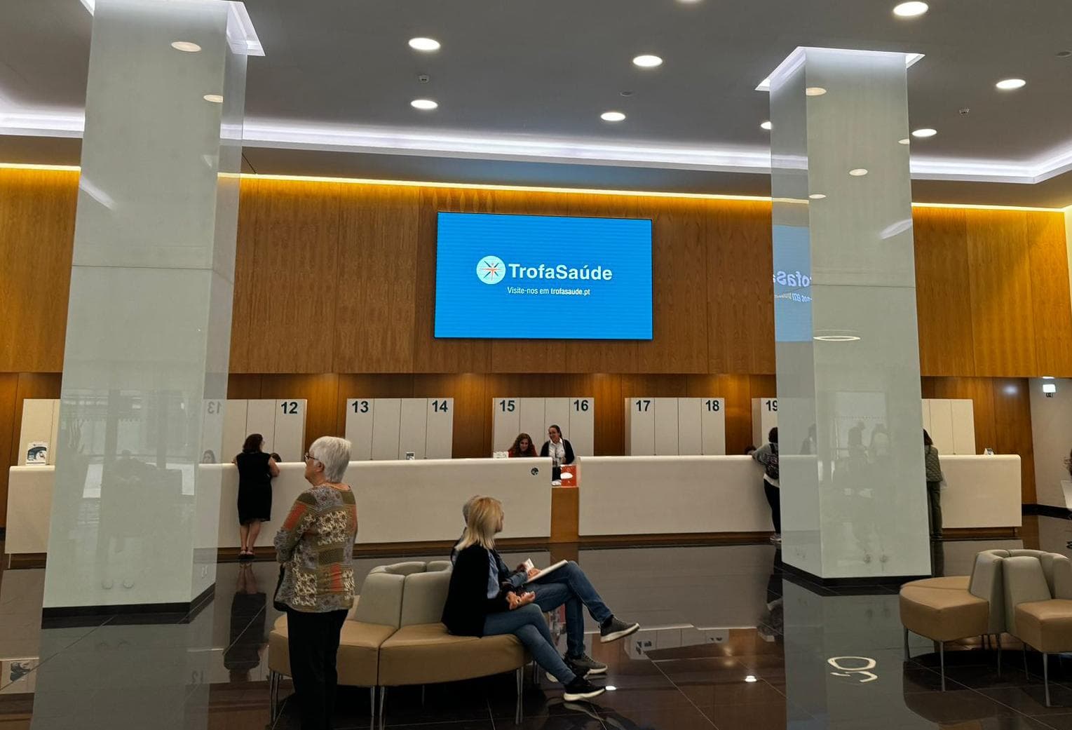 Professional indoor LED display in a modern institutional interior